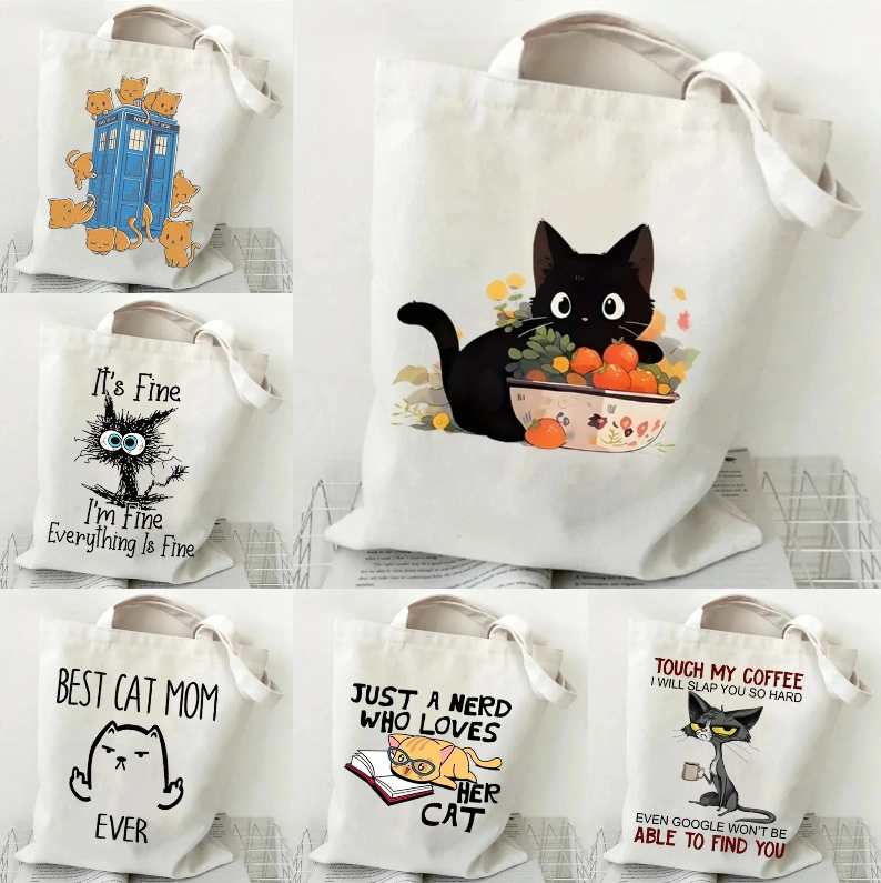 Cat and Book Canvas Handbag La - Tote Bag Canvas Print recension och pris