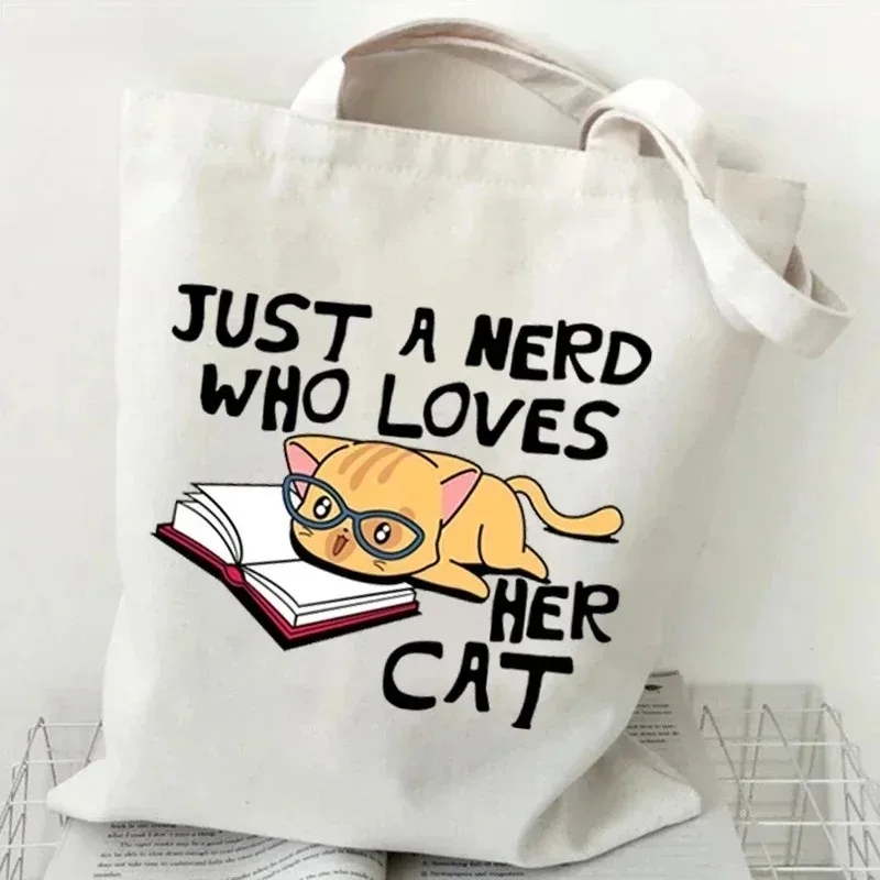 Cat and Book Canvas Handbag La - Tote Bag Canvas Print recension och pris