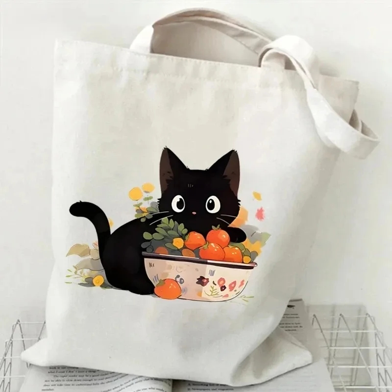 Cat and Book Canvas Handbag La - Tote Bag Canvas Print recension och pris